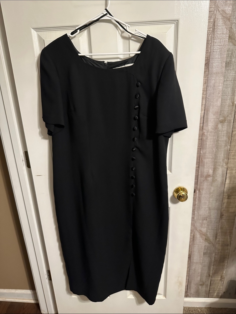 Elegant Black Midi Dress with Asymmetric Button Detail